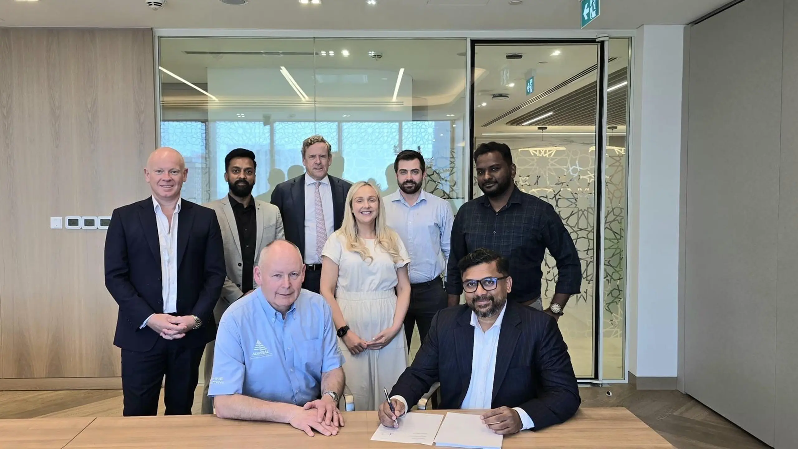 AESSEAL and Technomax representatives sign agreement.